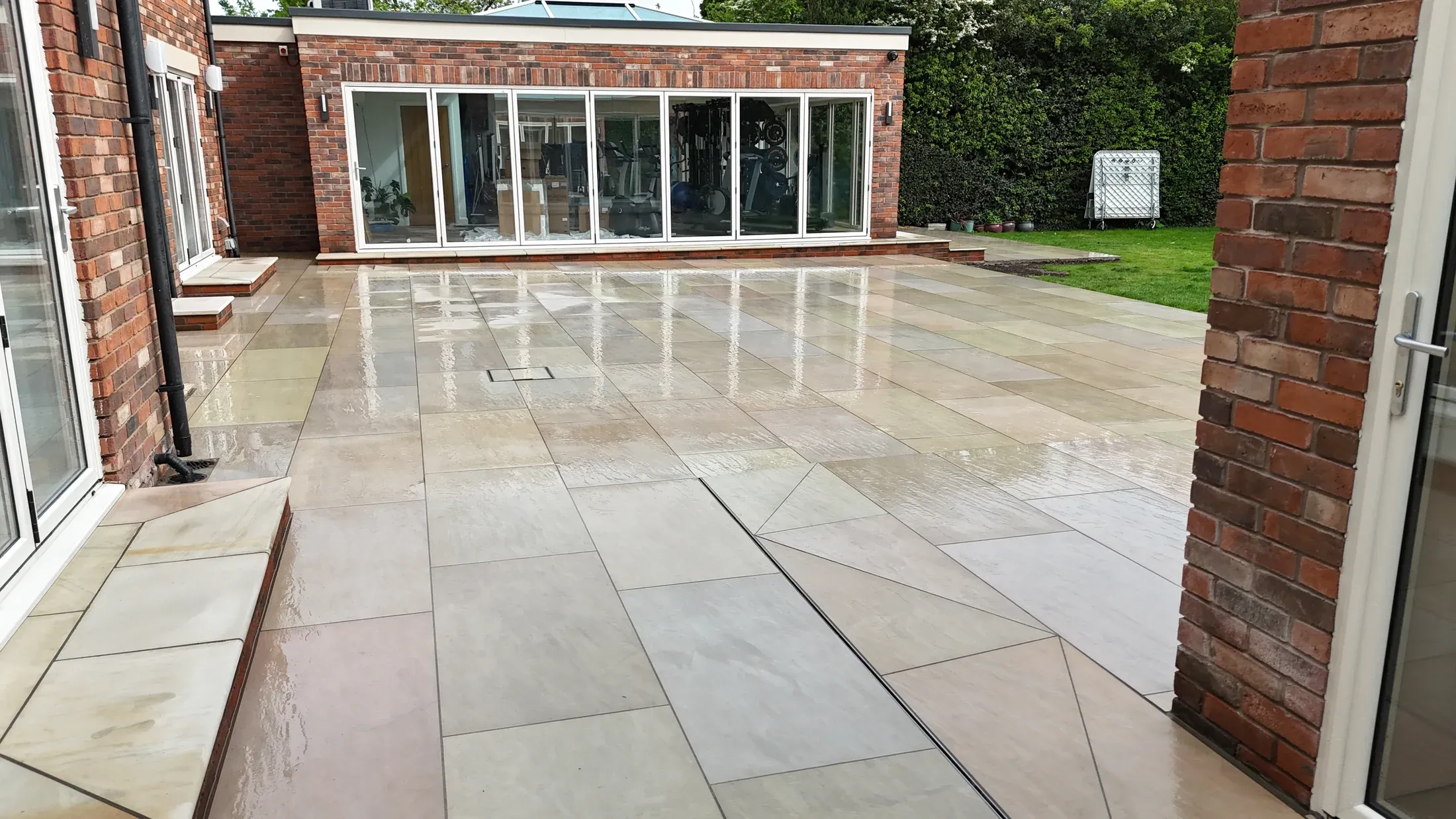 Finished resin patio shown within the complete garden setting